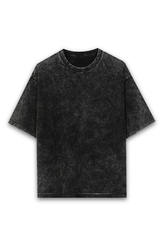 Front view of a black acid wash unisex t-shirt with a vintage, distressed texture. The t-shirt has a relaxed, oversized fit with dropped shoulders and visible seam detailing, reflecting a streetwear-inspired aesthetic. The front is plain with no visible graphics or text.