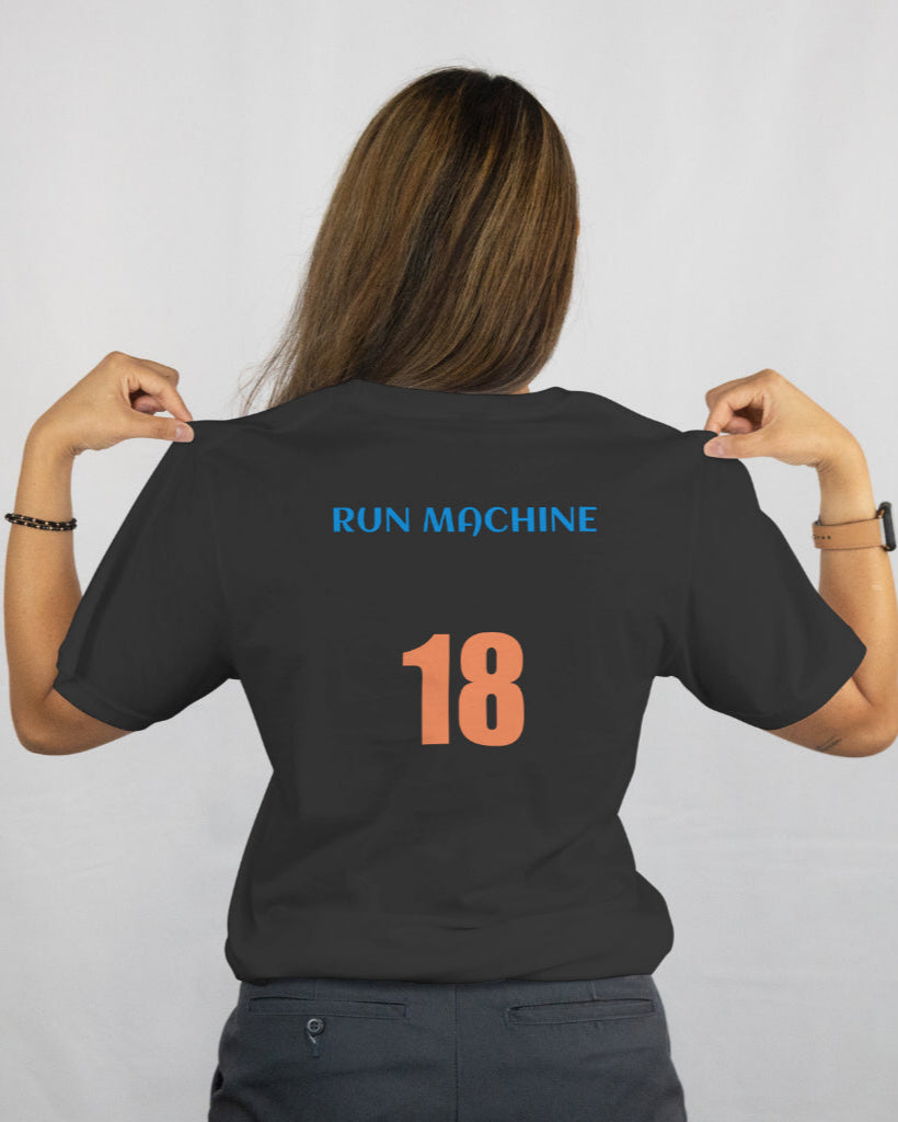 back view of a female model wearing a white Virat Kohli tshirt with caption 'Run Machine 18'