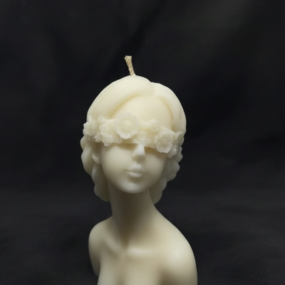 Ivory Blindfolded Oracle bust candle with floral crown, perfect for unique home decor and gifts.