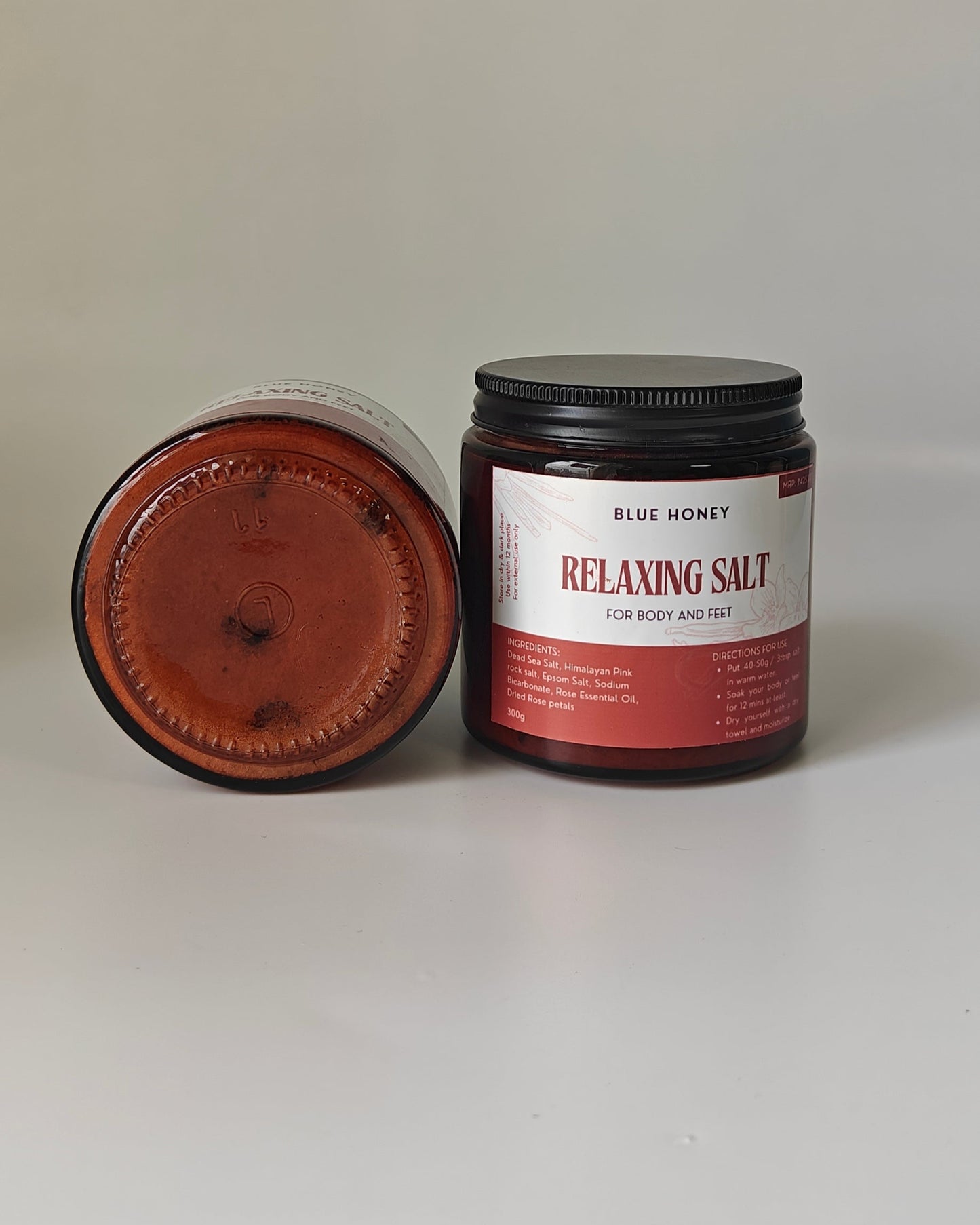 Jar of Blue Honey relaxing salt on a white background