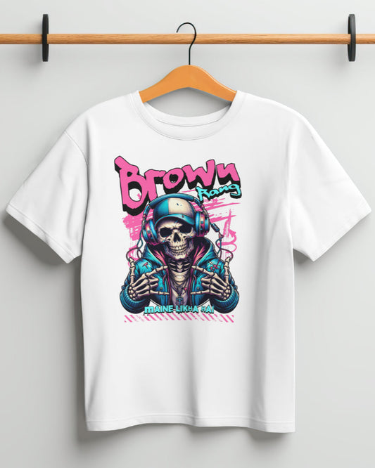 White t-shirt featuring a colorful graphic of a skeleton wearing a hoodie and headphones, making a hand gesture. The background has a pink paint-splatter effect with graffiti-style text that reads "Brown Rang" at the top and "MAINE LIKHA HAI" at the bottom.