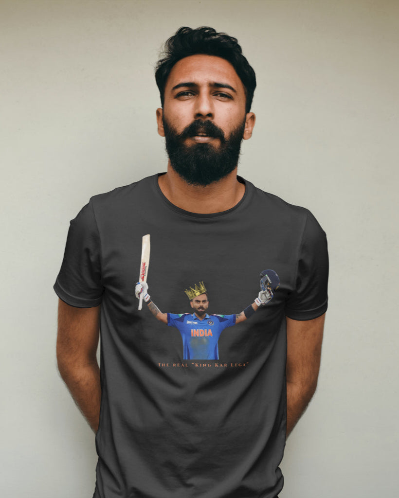 front view of a male Indian model wearing a black color Virat Kohli tshirt