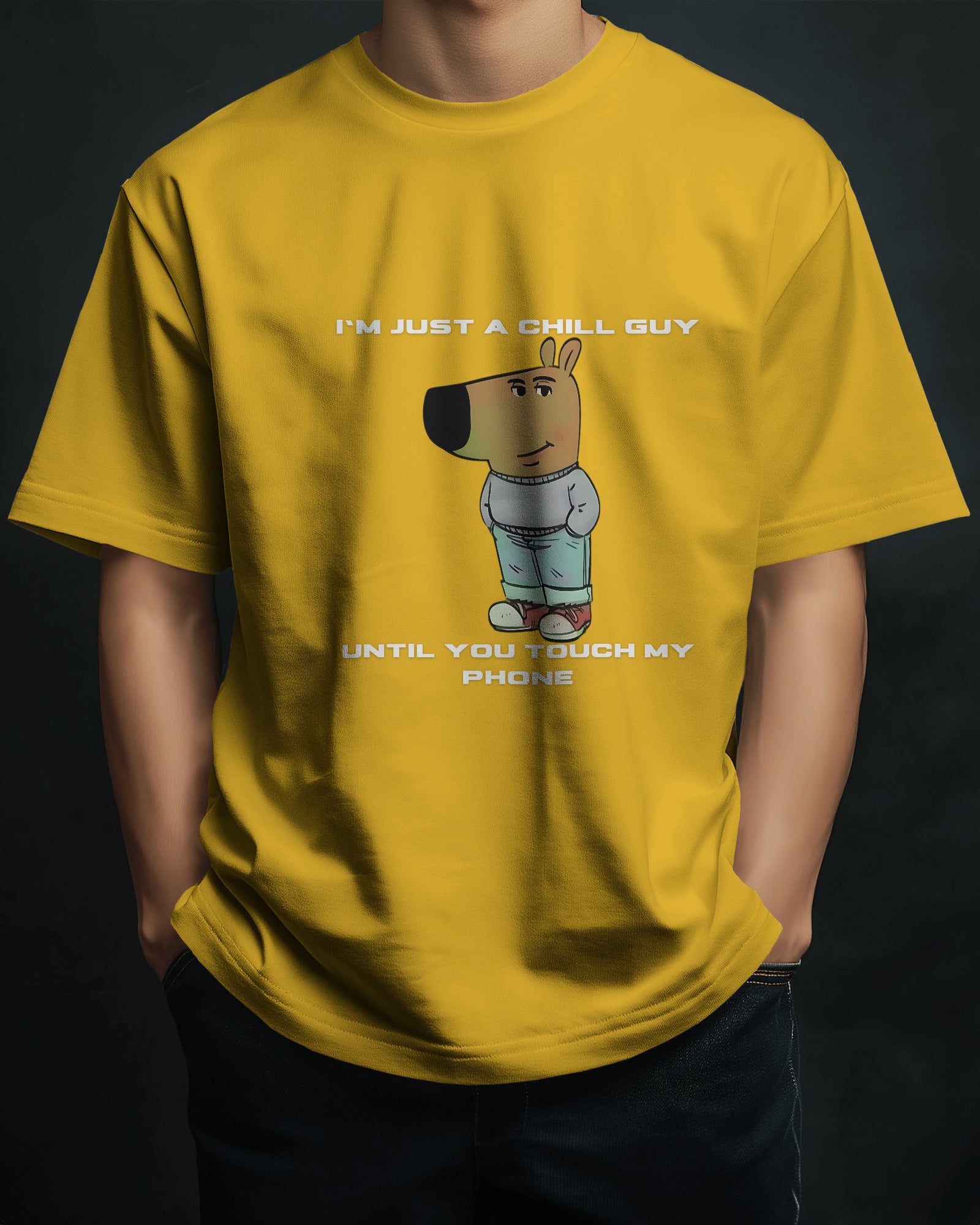 a male model standing with his hands in his pockets wearing a yellow "I’m Just a Chill Guy… Until You Touch My Phone" tshirt