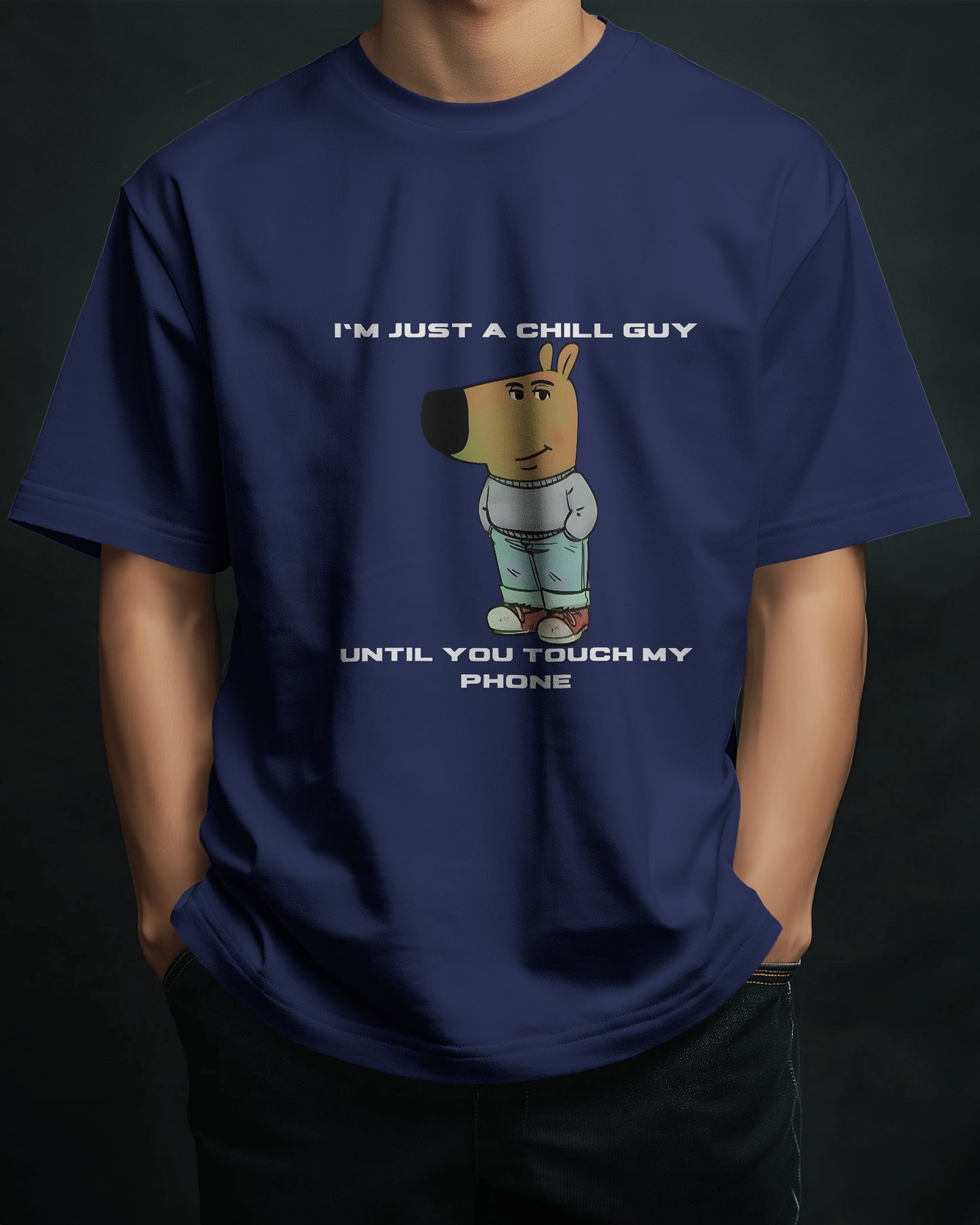 a male model standing with his hands in his pockets wearing a navy "I’m Just a Chill Guy… Until You Touch My Phone" tshirt
