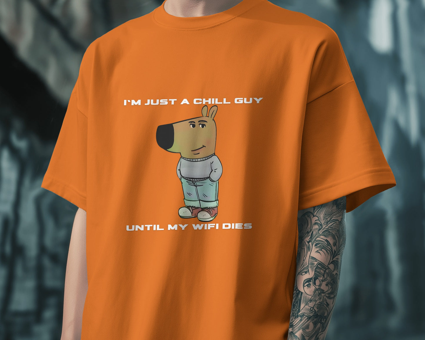 a model wearing I'm just a chill guy until my WIFI dies orange t-shirt.