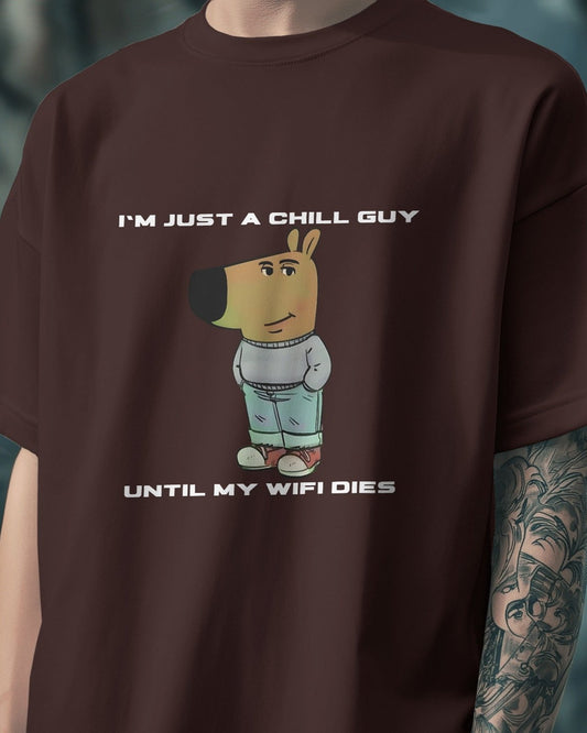 a model wearing I'm just a chill guy until my WIFI dies coffee brown t-shirt.