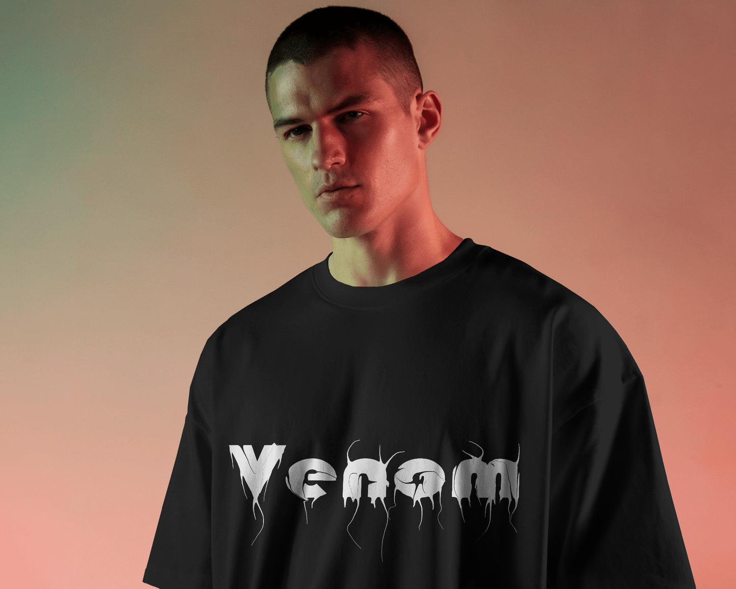 an american male model wearing an oversized Venom tshirt