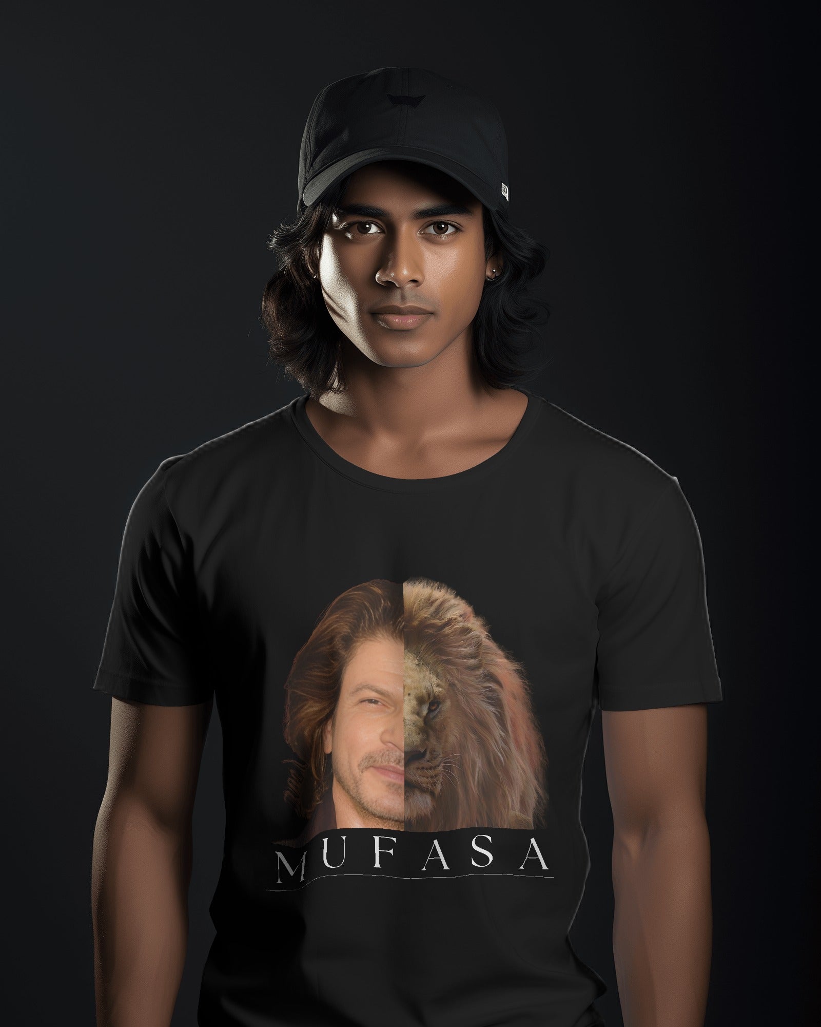 an Indian male model wearing a black cap and black classic half sleeve round neck SRK-Mufasa graphic tshirt.