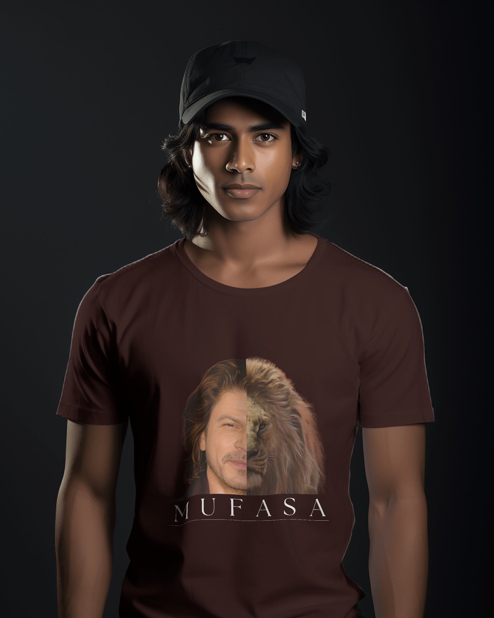 an Indian male model wearing a black cap and brown classic half sleeve round neck SRK-Mufasa graphic tshirt.