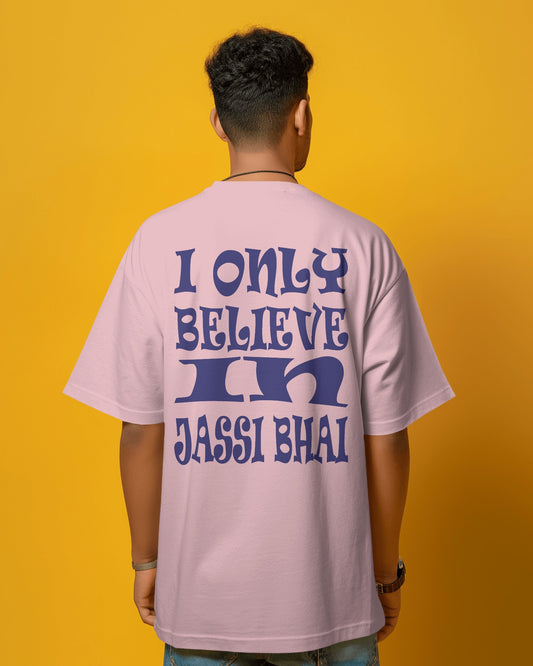 Back view of a male model wearing I only Believe in Jassi Bhai Oversized Tshirt pink