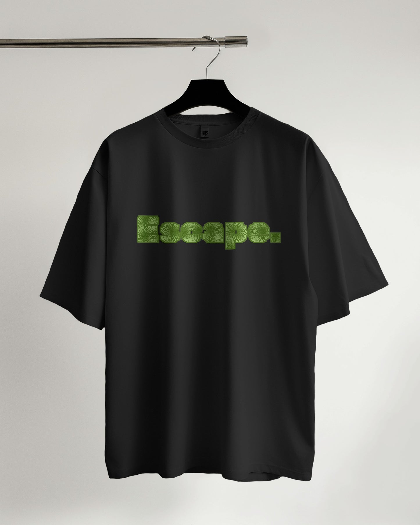 an oversized ESCAPE Tshirt on a hanger black