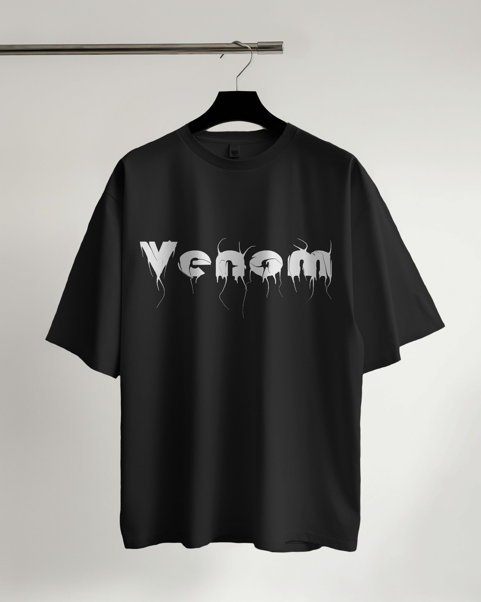 oversized black color Venom tshirt on a hanger