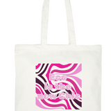 White tote bag featuring a retro wavy pattern with the text 'Eco is the New Chic' in pink.