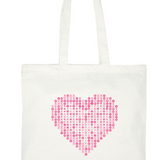 White canvas tote bag featuring a large pink heart made of 'XOXO' patterns, perfect for shopping.