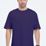 Front view of a unisex oversized purple t-shirt with a motivational quote, perfect for casual wear.