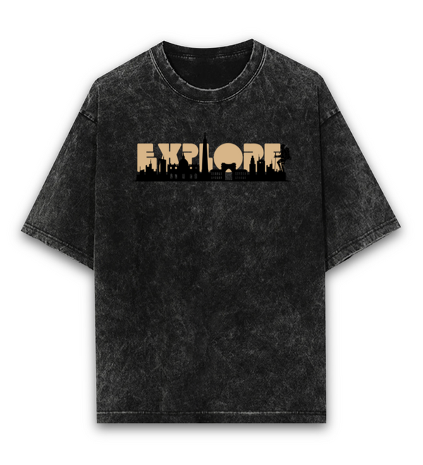 Front view of a black acid wash unisex t-shirt with the word 'EXPLORE' and a city skyline graphic.