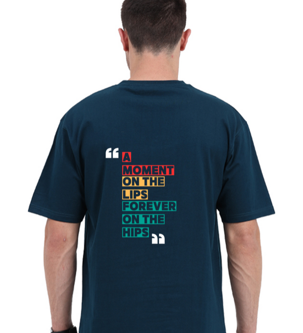 Back view of a unisex oversized navy blue t-shirt with colorful 'A Moment on the Lips, Forever on the Hips' typography.