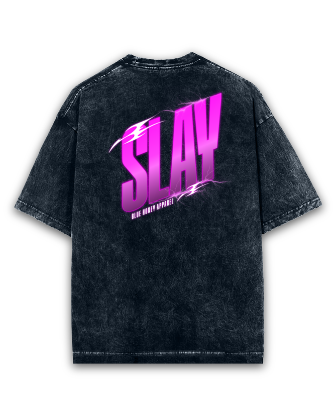 Back view of a unisex, oversized, acid-washed black t-shirt with a vibrant pink 'SLAY' graphic.