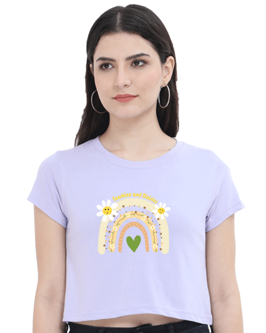 Sunshine and Daisies crop tee in lavender, featuring a cute rainbow and daisy graphic, perfect for casual everyday style.