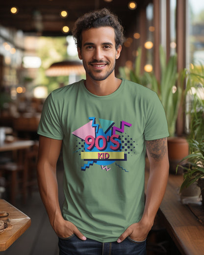 A male model with his hands in his pocket wearing aa '90s Kid' Jade T-shirt