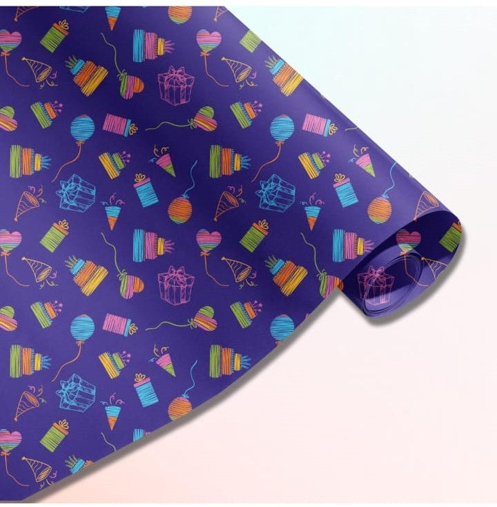 Rolled purple gift wrap featuring a colorful hand-drawn birthday pattern with balloons, cakes, and presents.