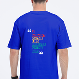 Back view of a blue unisex oversized t-shirt with colorful 'A Moment on the Lips, Forever on the Hips' typography.