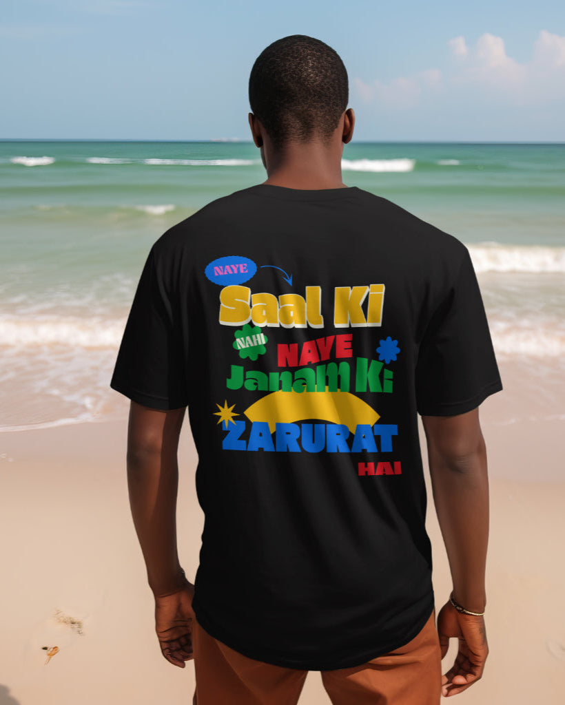 back view of a black male wearing 'Naye Saal Ki Nahi Naye Janam Ki Zarurat Hai' Black Tshirt