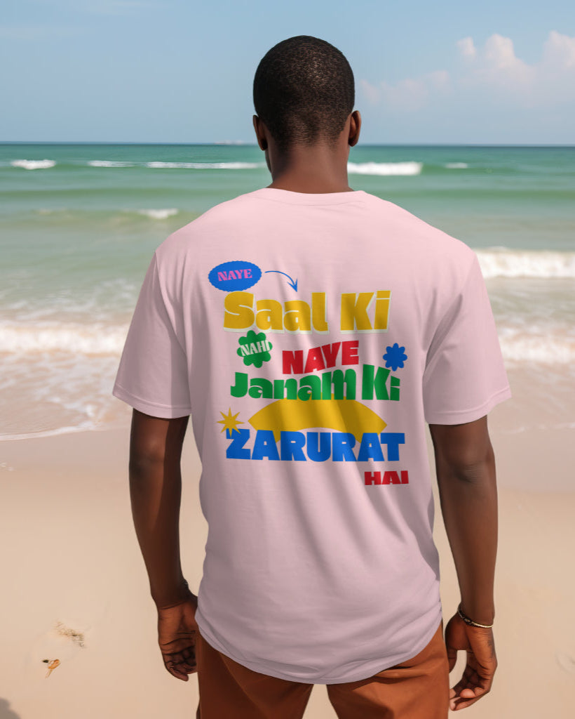 back view of a black male wearing 'Naye Saal Ki Nahi Naye Janam Ki Zarurat Hai' Pink Tshirt