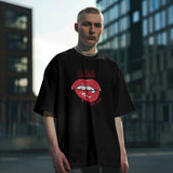 Black oversized t-shirt with a bold red glitter lips graphic and "Oops! My Bad" text.
