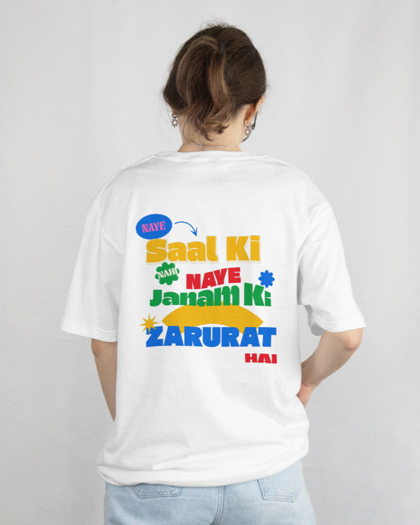 back view of a female wearing 'Naye Saal Ki Nahi Naye Janam Ki Zarurat Hai' white Tshirt