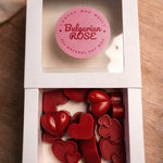 Bulgarian Rose Heart Diffuser Gift Set with red heart-shaped wax melts and a round label.