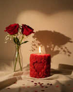 Red Valentine sculpted candle with floral scent, featuring a 'Love' inscription and rose details, perfect for romantic gifting and decor.