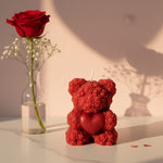 Red floral sculpted bear candle with a heart, perfect for Valentine's Day gifting and romantic decor.