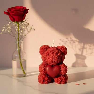 Red floral sculpted bear candle with a heart, perfect for Valentine's Day gifting and romantic decor.
