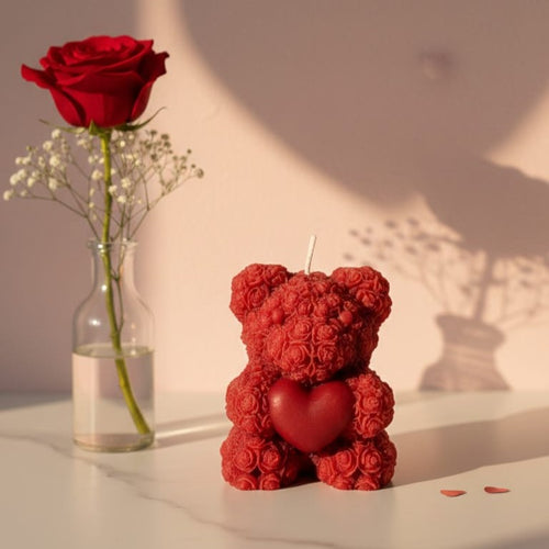 Red floral sculpted bear candle with a heart, perfect for Valentine's Day gifting and romantic decor.