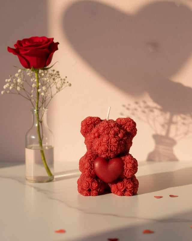 Red floral sculpted bear candle with a heart, perfect for Valentine's Day gifting and romantic decor.