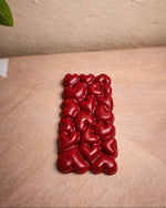 Bulgarian Rose Heart Diffuser Gift Set, a red heart-shaped aromatherapy diffuser, presented from a front view.