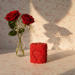 Red Valentine sculpted candle with floral design and 'Love' inscription, perfect for romantic gifting and decor.