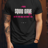 Black t-shirt with "I Played Squid Game And All I Got Was This Lousy T-Shirt" graphic.