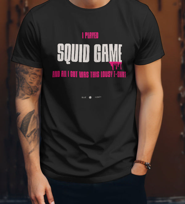 Black t-shirt with "I Played Squid Game And All I Got Was This Lousy T-Shirt" graphic.