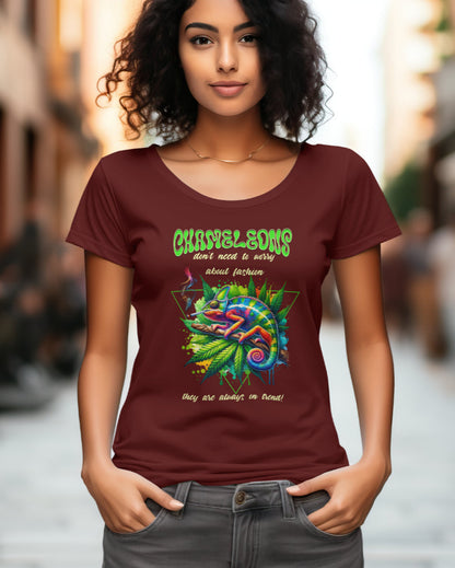 A female model with her hands in her pocket wearing "Chameleons Are Always in Trend" half-sleeve maroon t-shirt