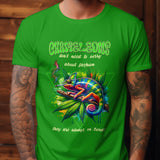 Green t-shirt with a colorful chameleon smoking a cigarette and the text 'Chameleons don't need to worry about fashion'.
