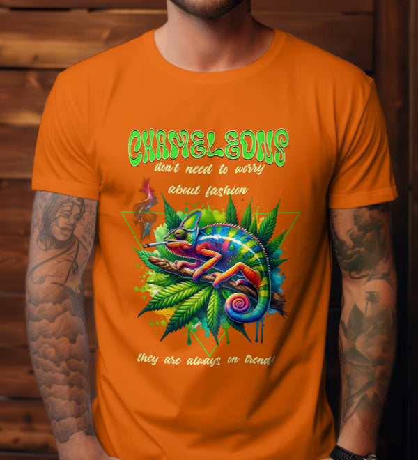 Orange t-shirt with a colorful chameleon relaxing on a branch with cannabis leaves, featuring text about fashion.