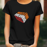 Black t-shirt with 'Hustle Hard Dream Big Stay Focused' graphic print on the front.