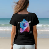 Back view of a black Cosmic Positive Vibes t-shirt with a psychedelic graphic and the word POSITIVE.