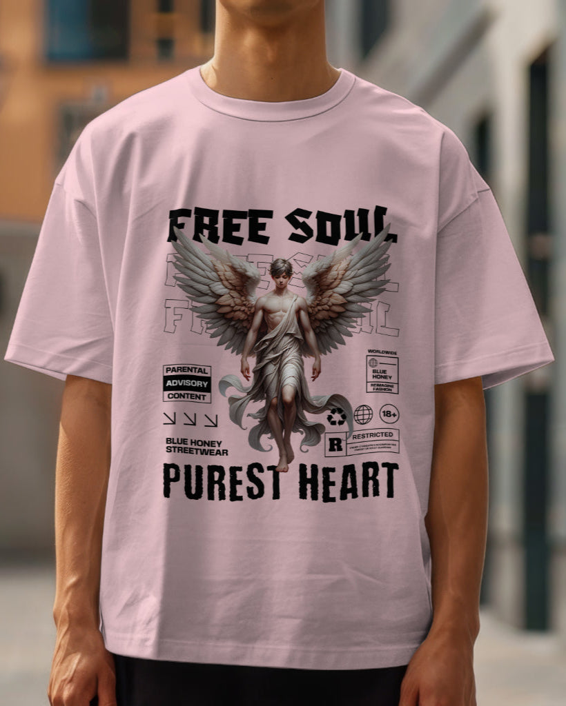 A male model wearing an oversized "Free Soul, Purest Heart Graphic" Half Sleeve Pink T-Shirt