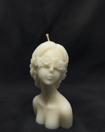 Ivory Blindfolded Oracle bust candle with floral crown, perfect for unique home decor and gifts.
