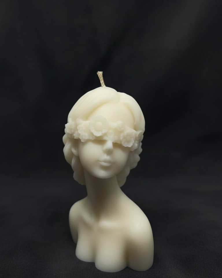 Ivory Blindfolded Oracle bust candle with floral crown, perfect for unique home decor and gifts.