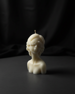 Ivory blindfolded oracle bust candle with intricate floral details, perfect for unique home decor and thoughtful gifts.