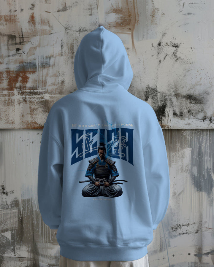 Back view of a light blue unisex hoodie featuring a samurai graphic with the text 'Sit with Grace, Live with Honor'.